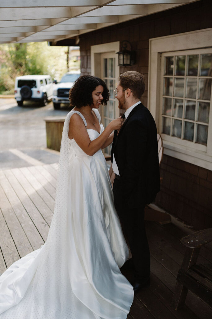 couple getting ready before their wedding at lake quinault lodge