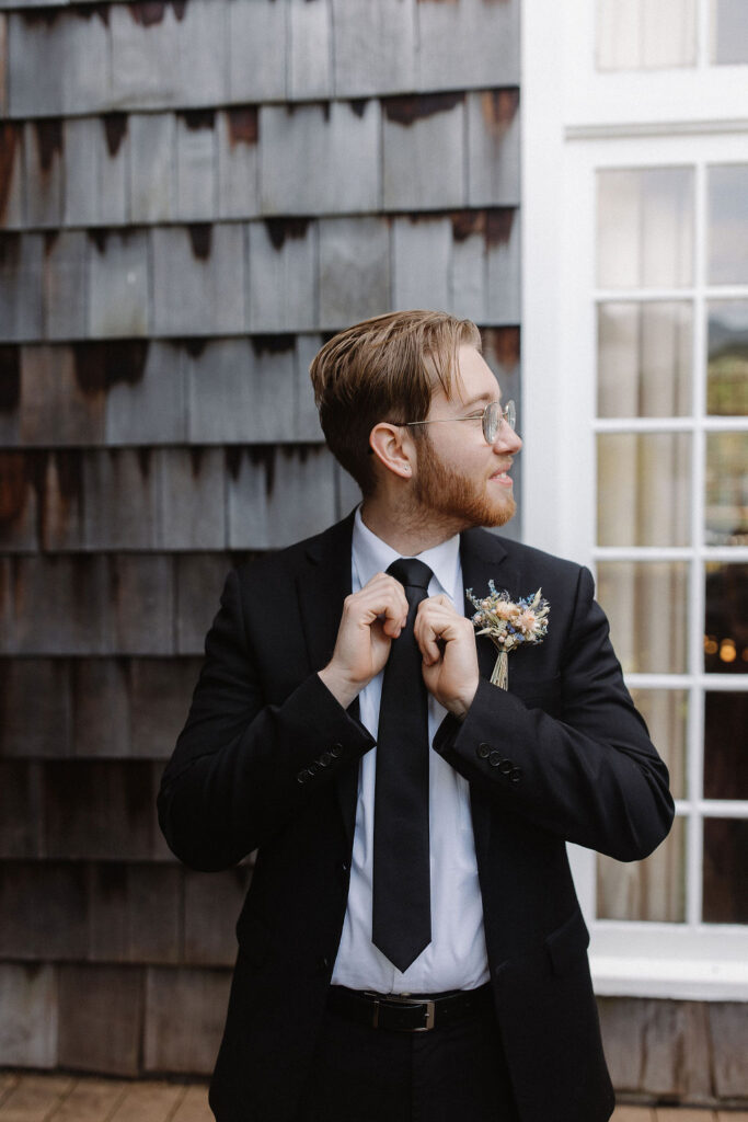 groom posing during his wedding photos 