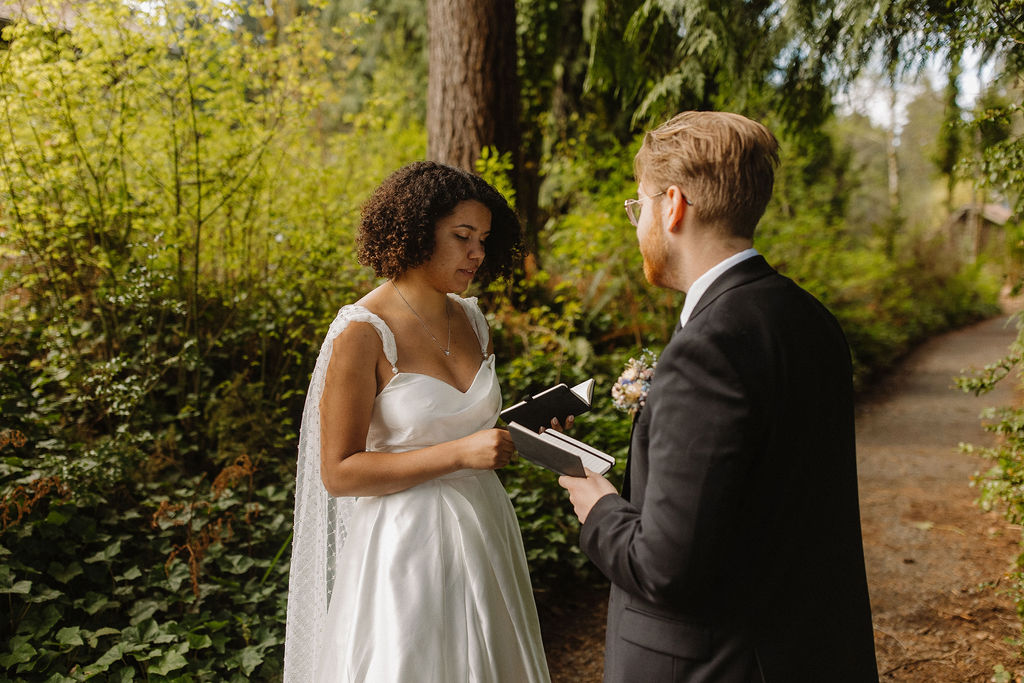 bride and groom reading their vows at lake quinault lodge