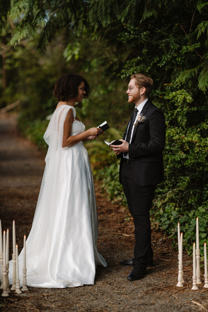 beautiful couple reading their vows 