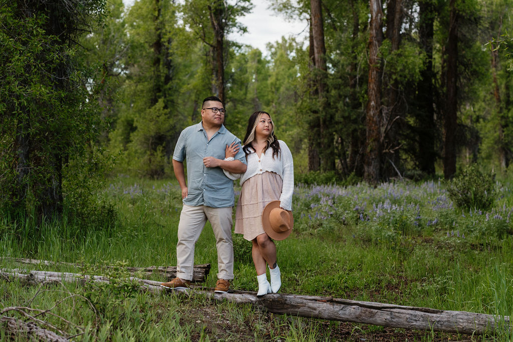 couple looking at the stunning mountains during their romantic boho engagement