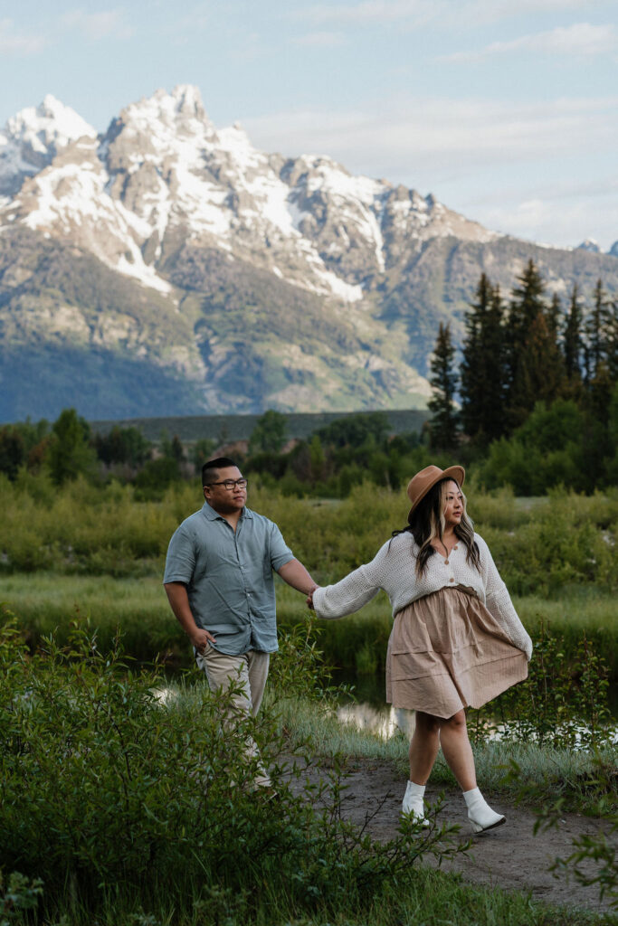 couple at gtnp during their romantic boho engagement session