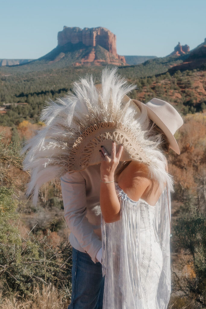 couple kissing at their sedona elopement session 