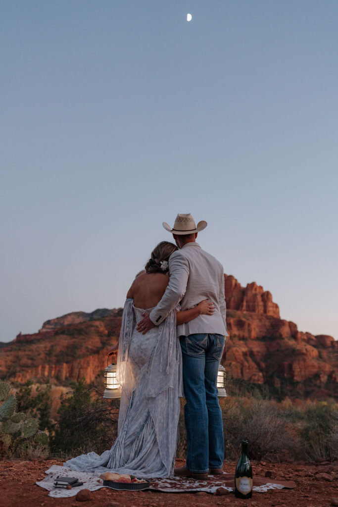 elope in sedona couple watching the mountains 