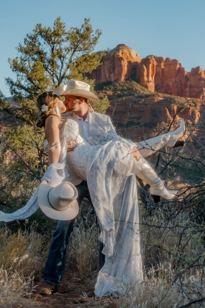 bride kissing the groom 