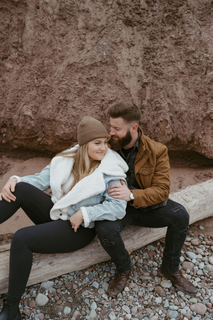 couple sitting during their engagement photoshoot