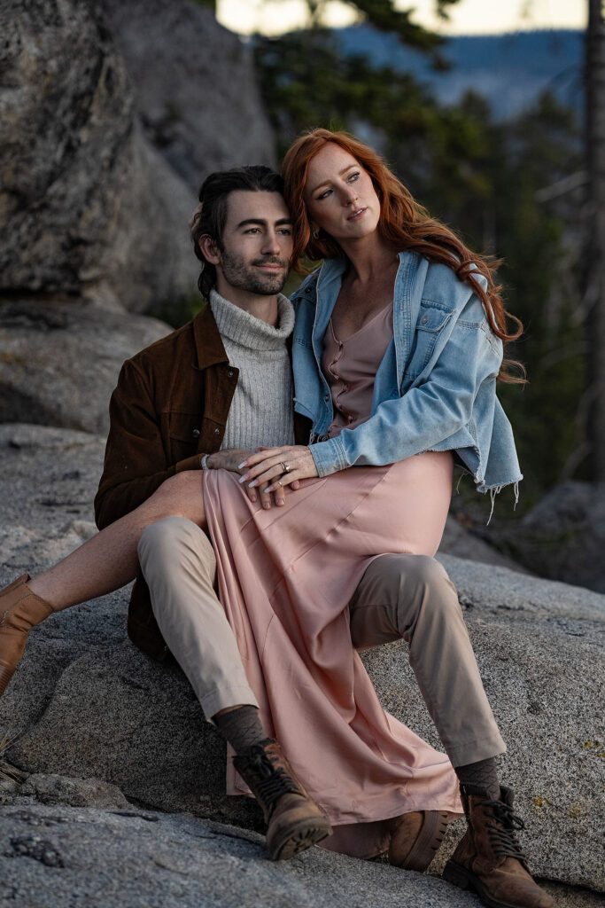 couple sitting during their sunrise engagement session