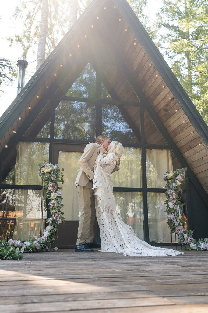 couple kissing after their wedding ceremony 