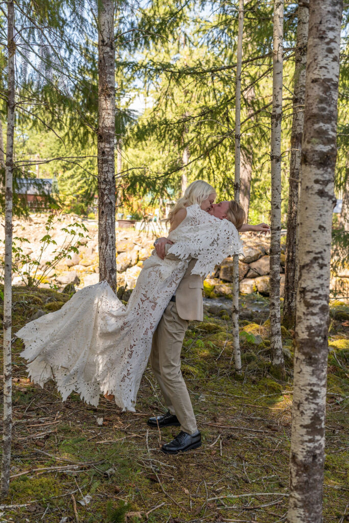 bride and groom hugging 