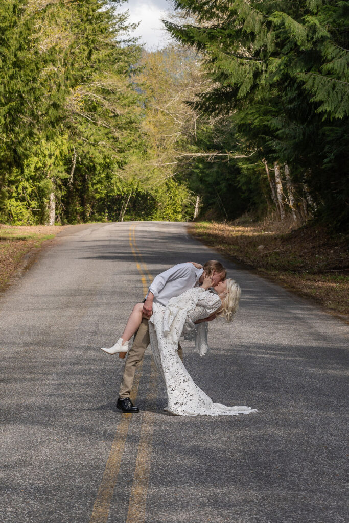 newly married couple kissing 