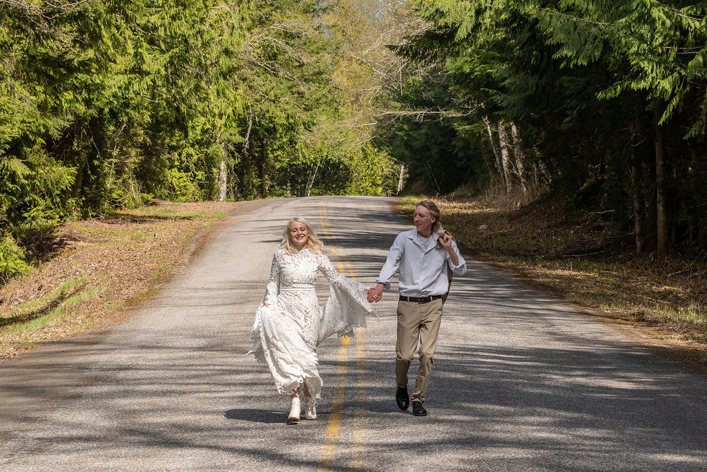 couple running holding hands 