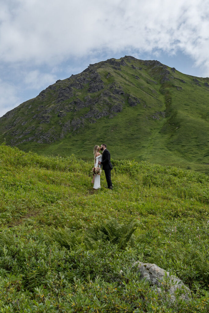 bride and groom kissing