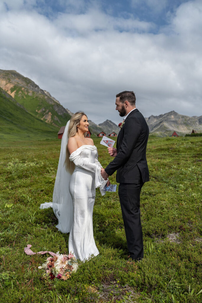 happy couple reading their vows