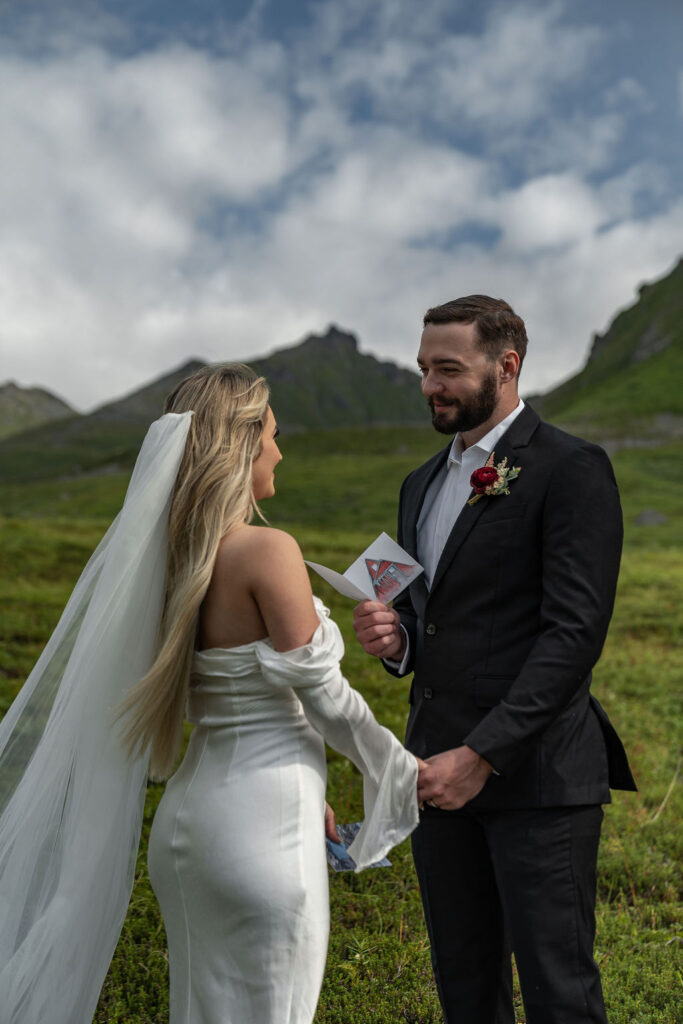 groom looking at the bride 