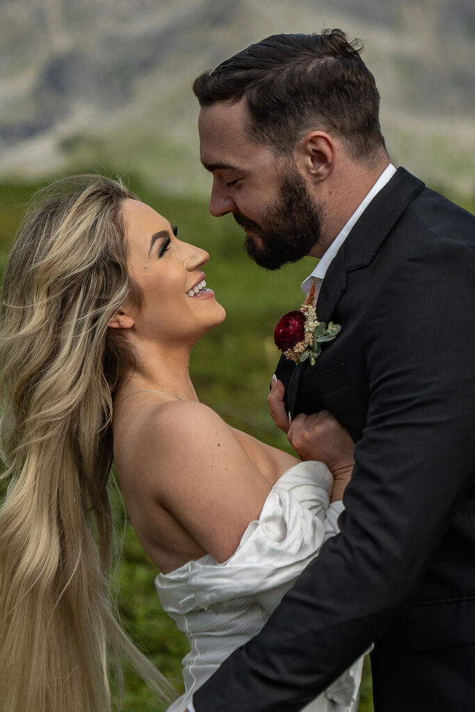 bride and groom looking at each other