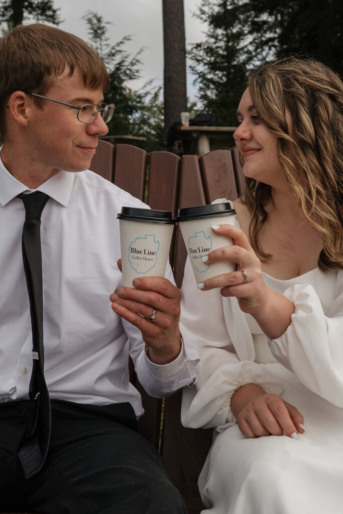 bride and groom drinking coffee