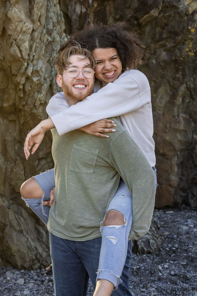 couple playing during their engagement photoshoot 