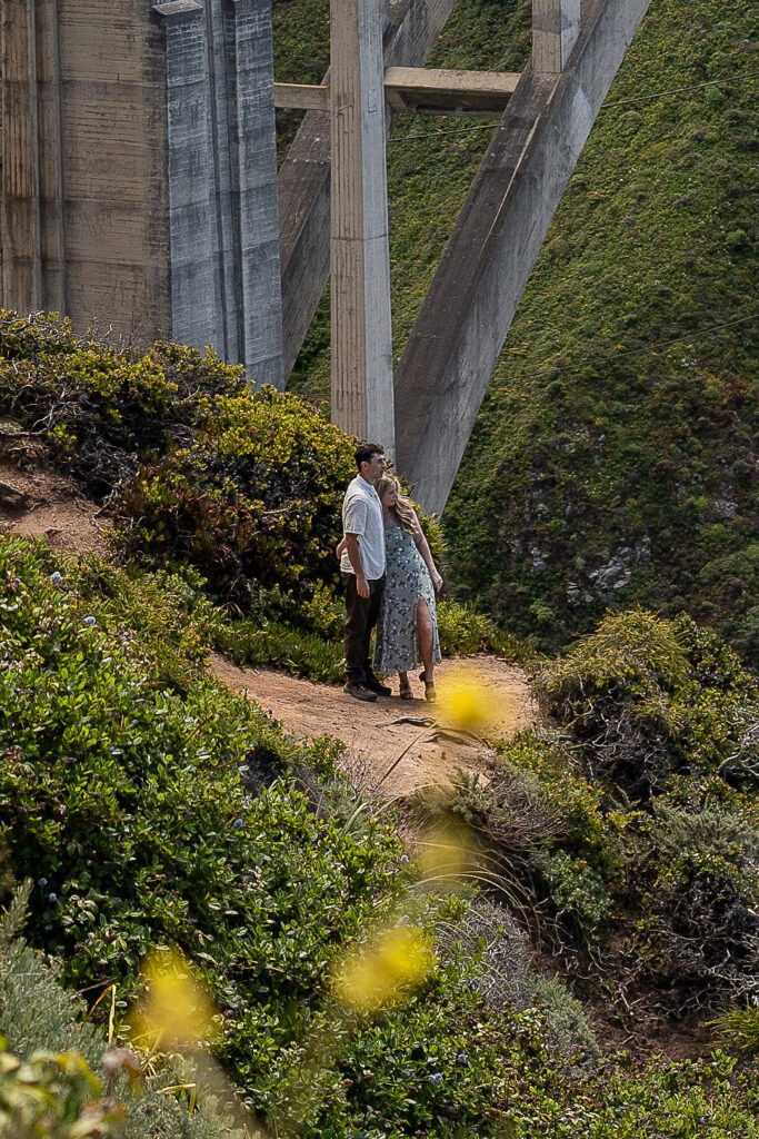 cute couple at their engagement session at bixby bridge 