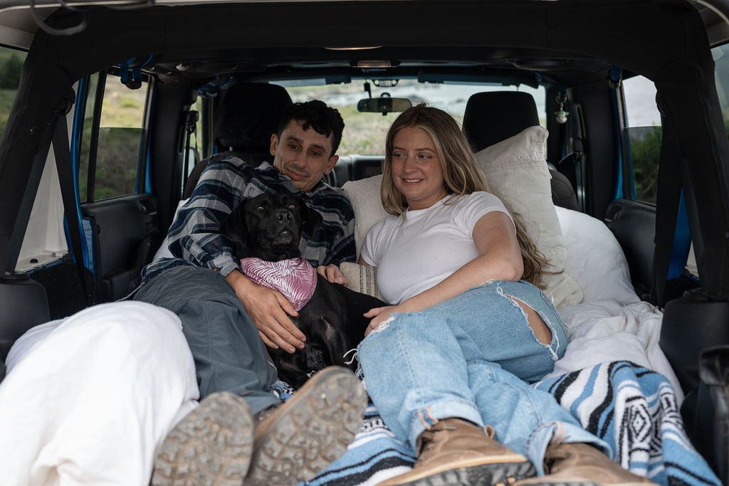 couple spending quality time with their adorable dog 