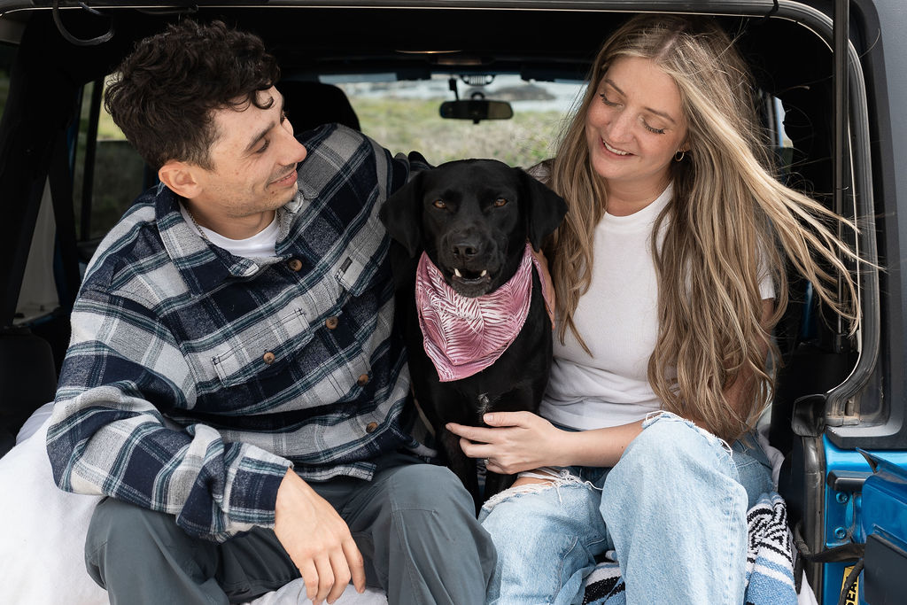 newly engaged couple with their dog