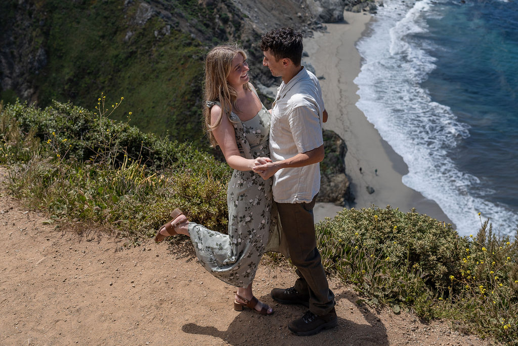 couple looking at each other at their Fun and Adventurous Engagement Session