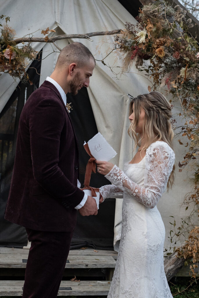 bride reading her wedding vows 