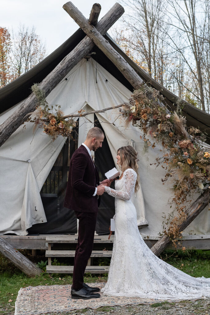 groom reading his wedding vows