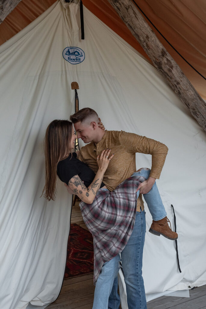 cute couple kissing during their photoshoot