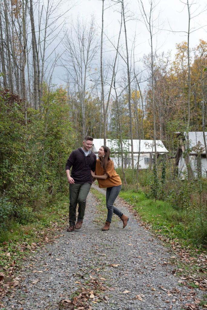 couple smiling at their adventure photoshoot