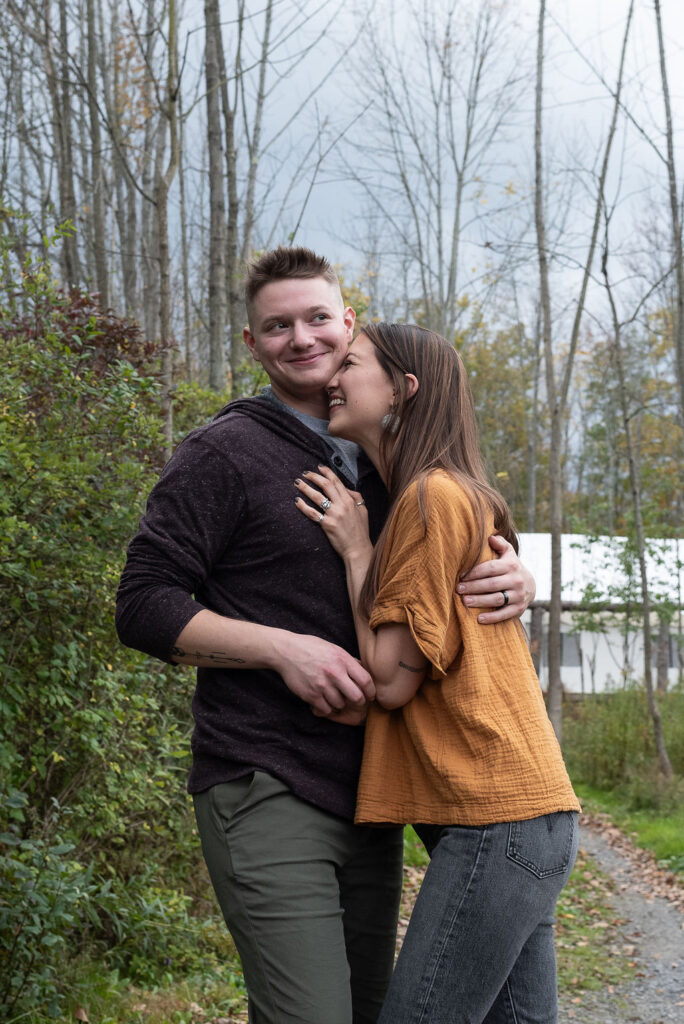 happy couple laughing during their engagement session