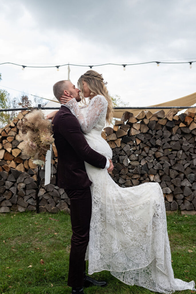 bride and groom kissing after their elopement ceremony