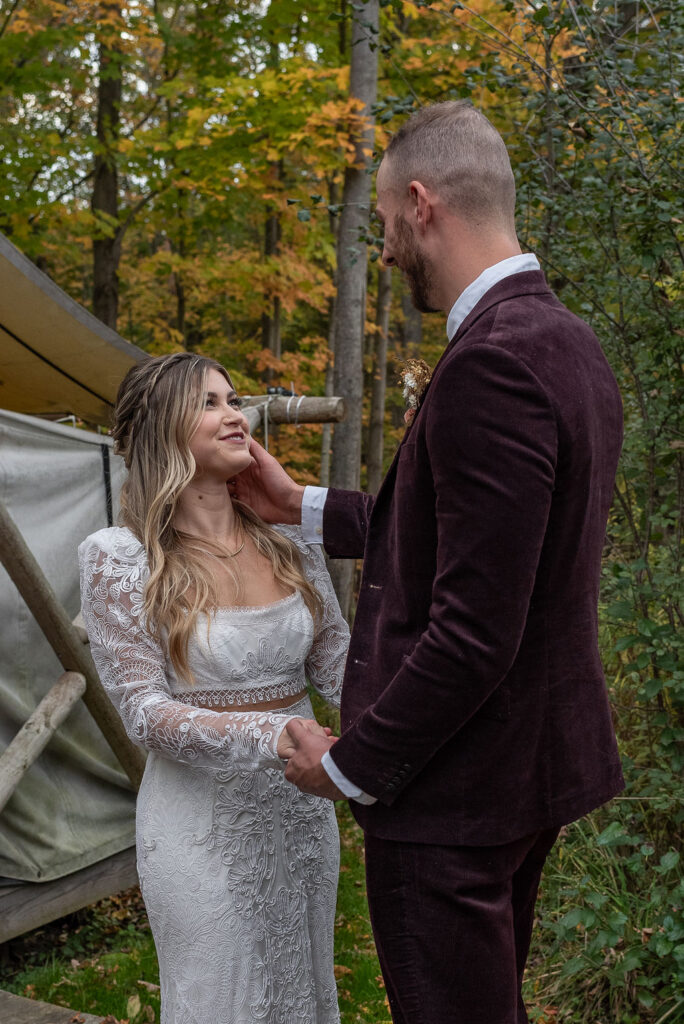 bride and groom looking at each other 