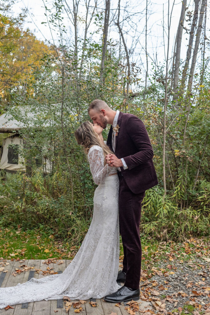 bride and groom kissing before their wedding ceremony