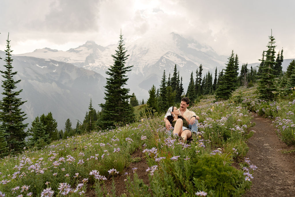 cute couple walking around wildflowers