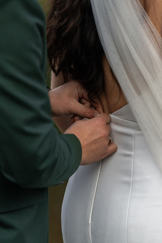 bride and groom getting ready for their adventure elopement 