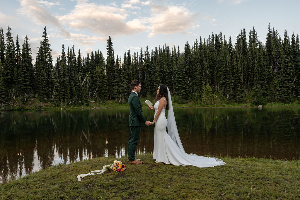 bride and groom reading their vows at their adventure elopement