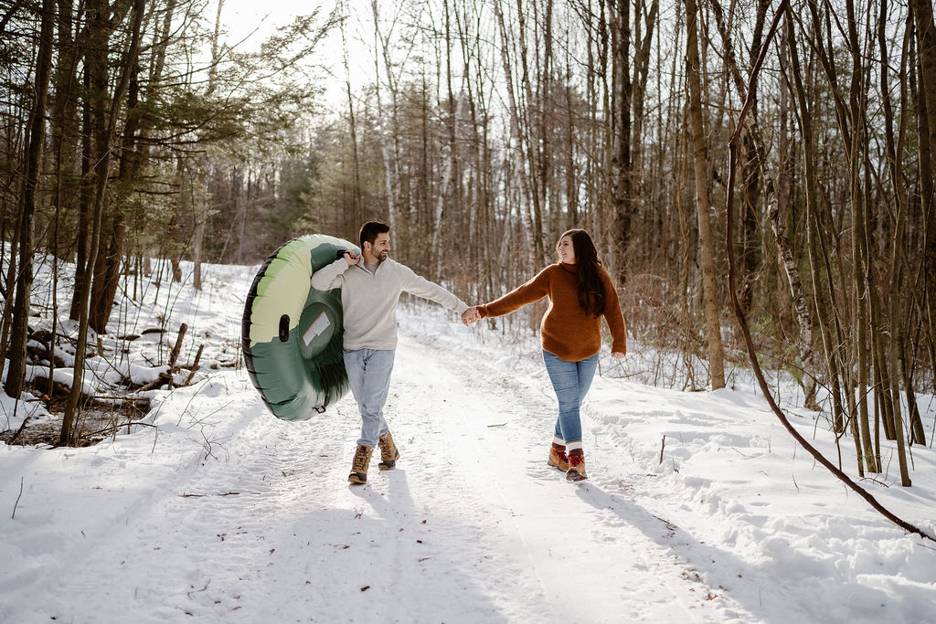 couple walking around lake george during their session