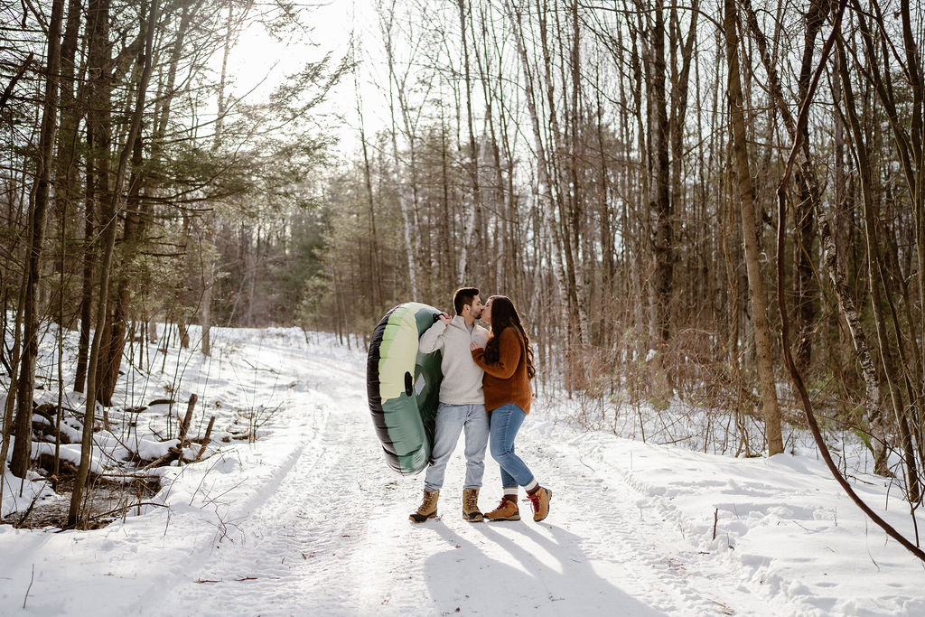 cute picture of the couple kissing during their winter couples session