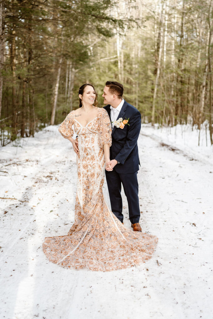 bride and groom holding hands