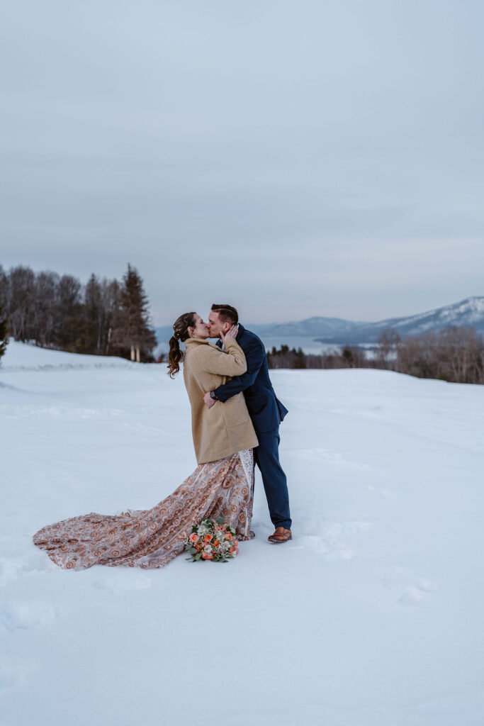 bride and groom kissing after their elopement ceremony 