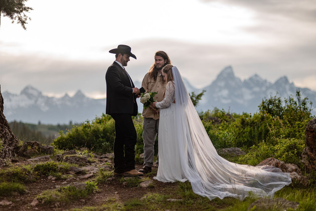 bride and groom at their adventurous elopement ceremony 