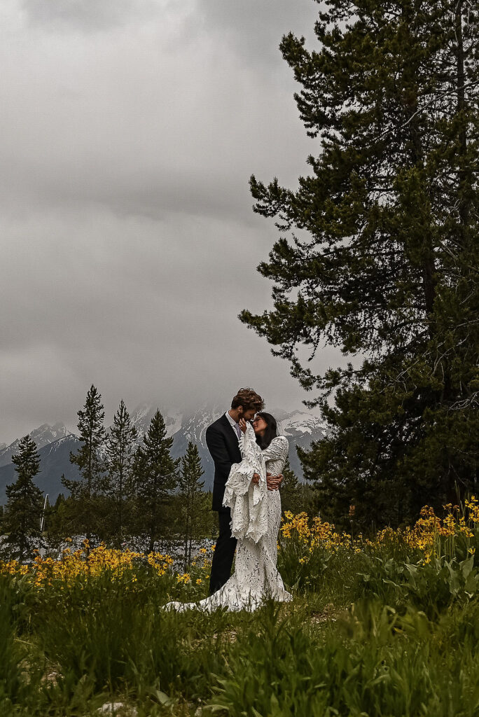 bride and groom looking at each other 