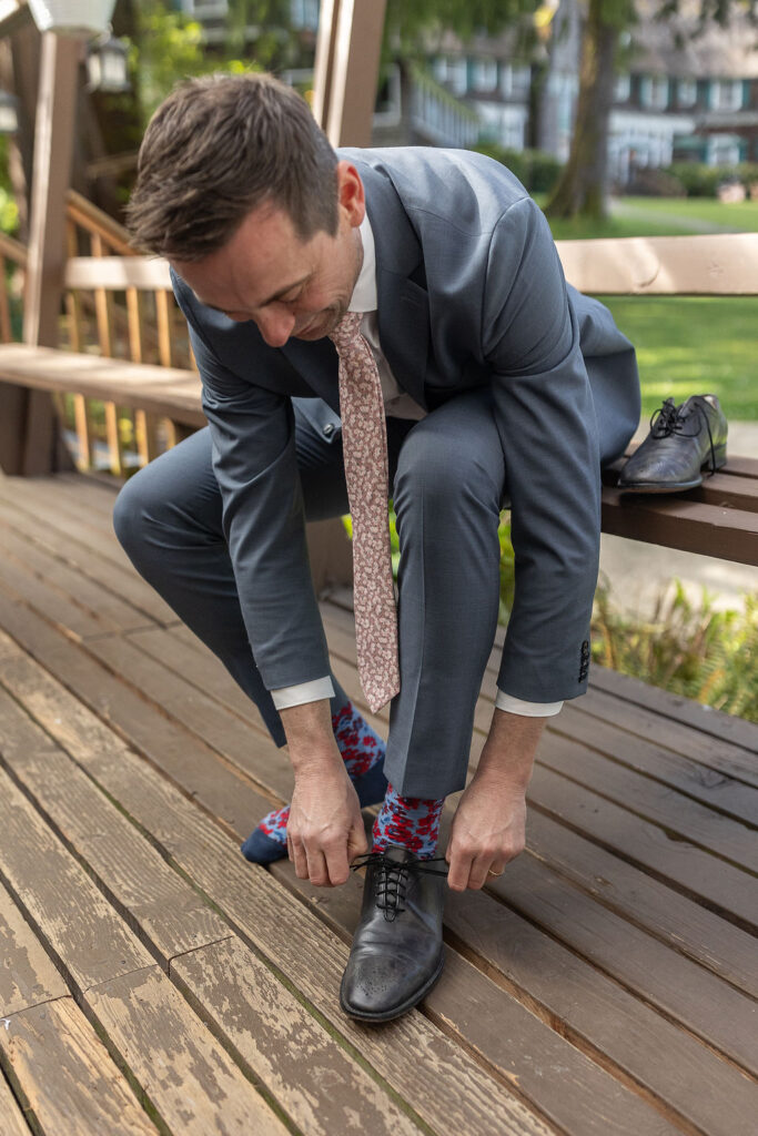 husband getting ready for his ceremony vow renewal