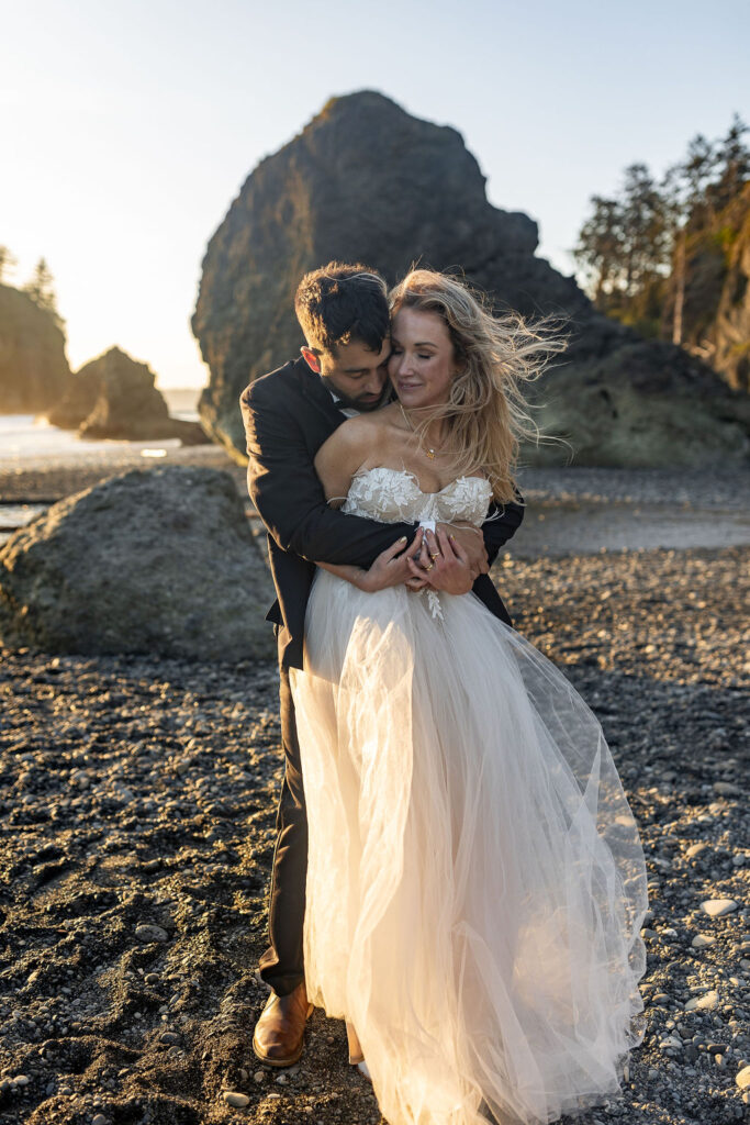 cute couple hugging during their golden hour photoshoot 