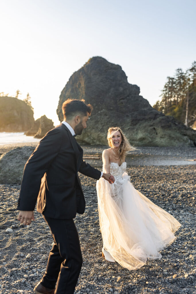 cute candid picture of the newly eloped couple at ruby beach 