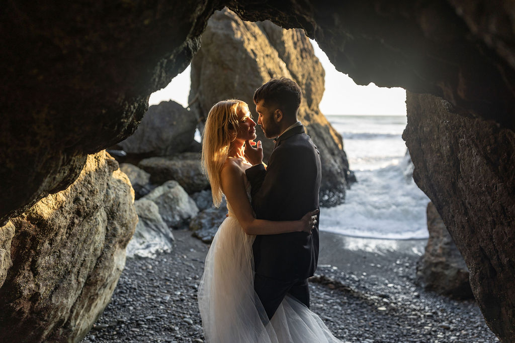 cute couple looking at each other during their golden hour photoshoot