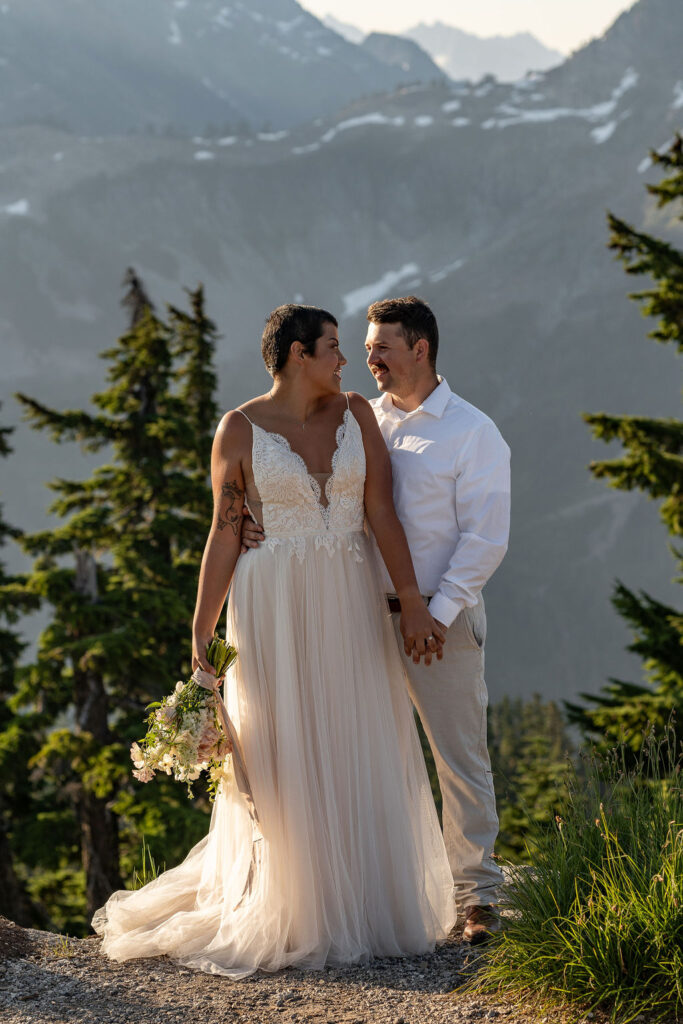 gorgeous picture of the bride and groom looking at each other during their photoshoot