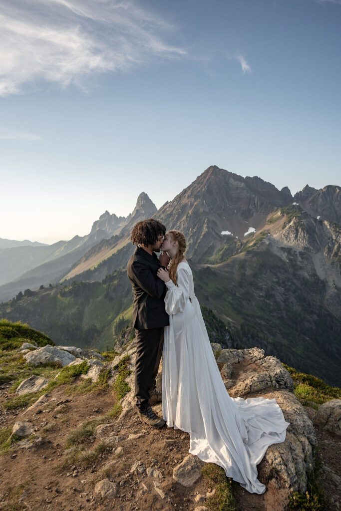 portrait of the bride and groom kissing