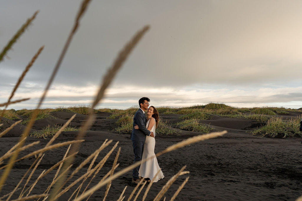 cute couple smiling to each other during their gorgeous bridal portraits