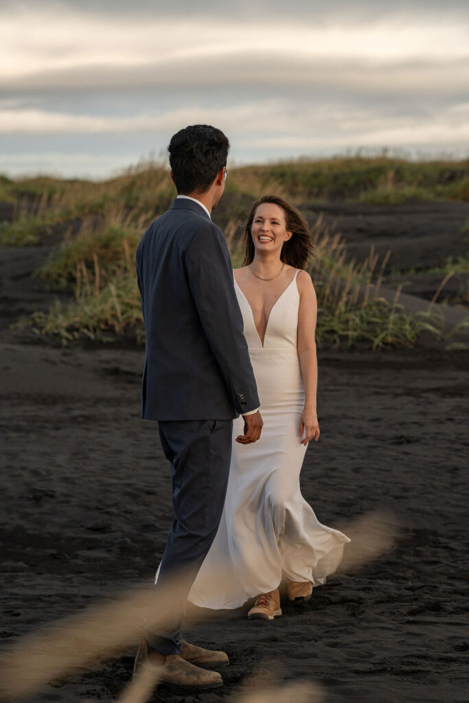 cute couple laughing during their adventurous photoshoot in iceland